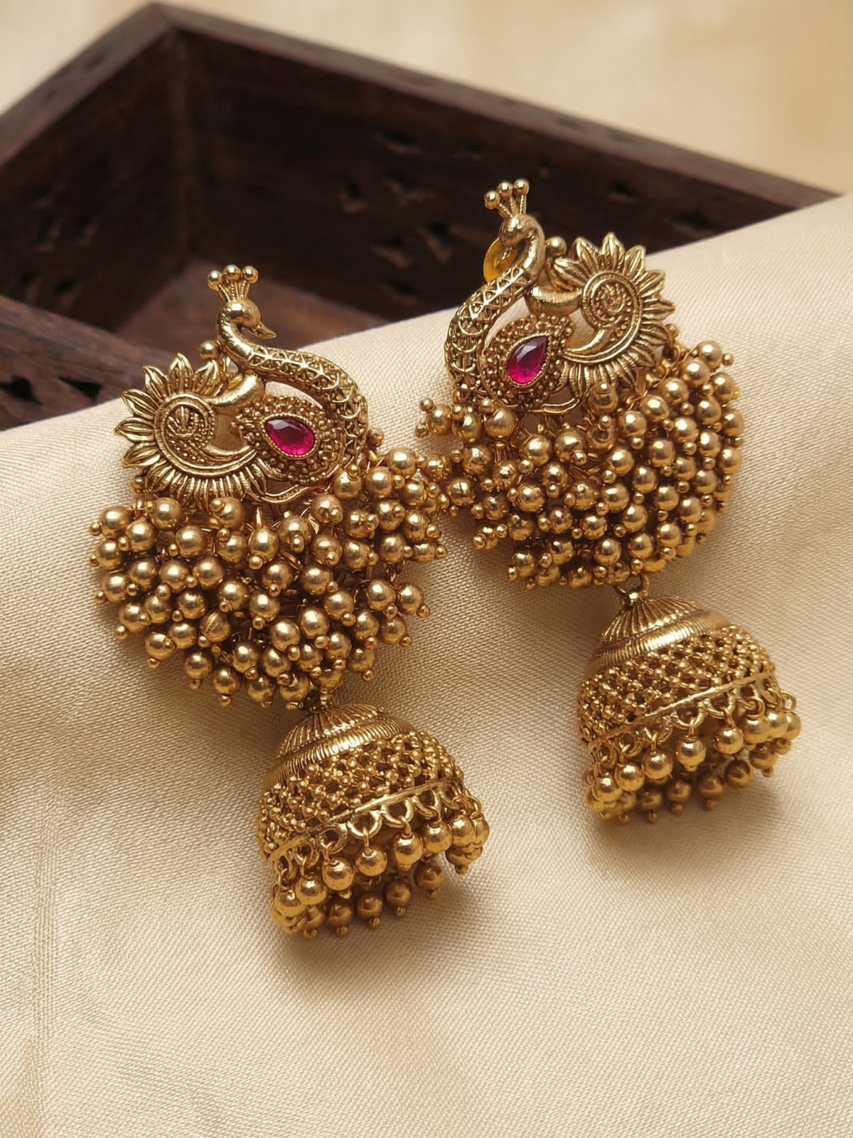 Antique Gold Peacock Jhumka Earrings with Ruby Stone