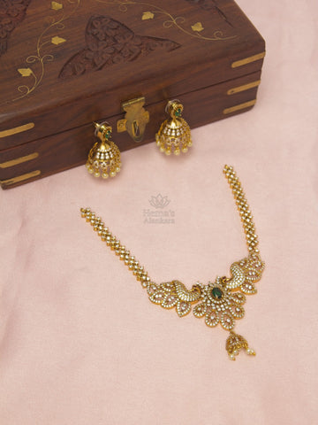 Royal CZ Peacock Necklace Set with Green Stone & Pearl Jhumkas