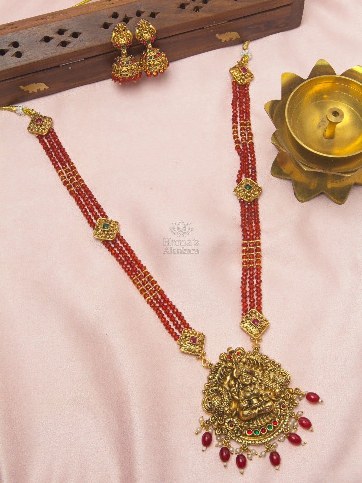 Antique Gold Lakshmi Pendant Red Crystal Beaded Necklace Set with Jhumkas