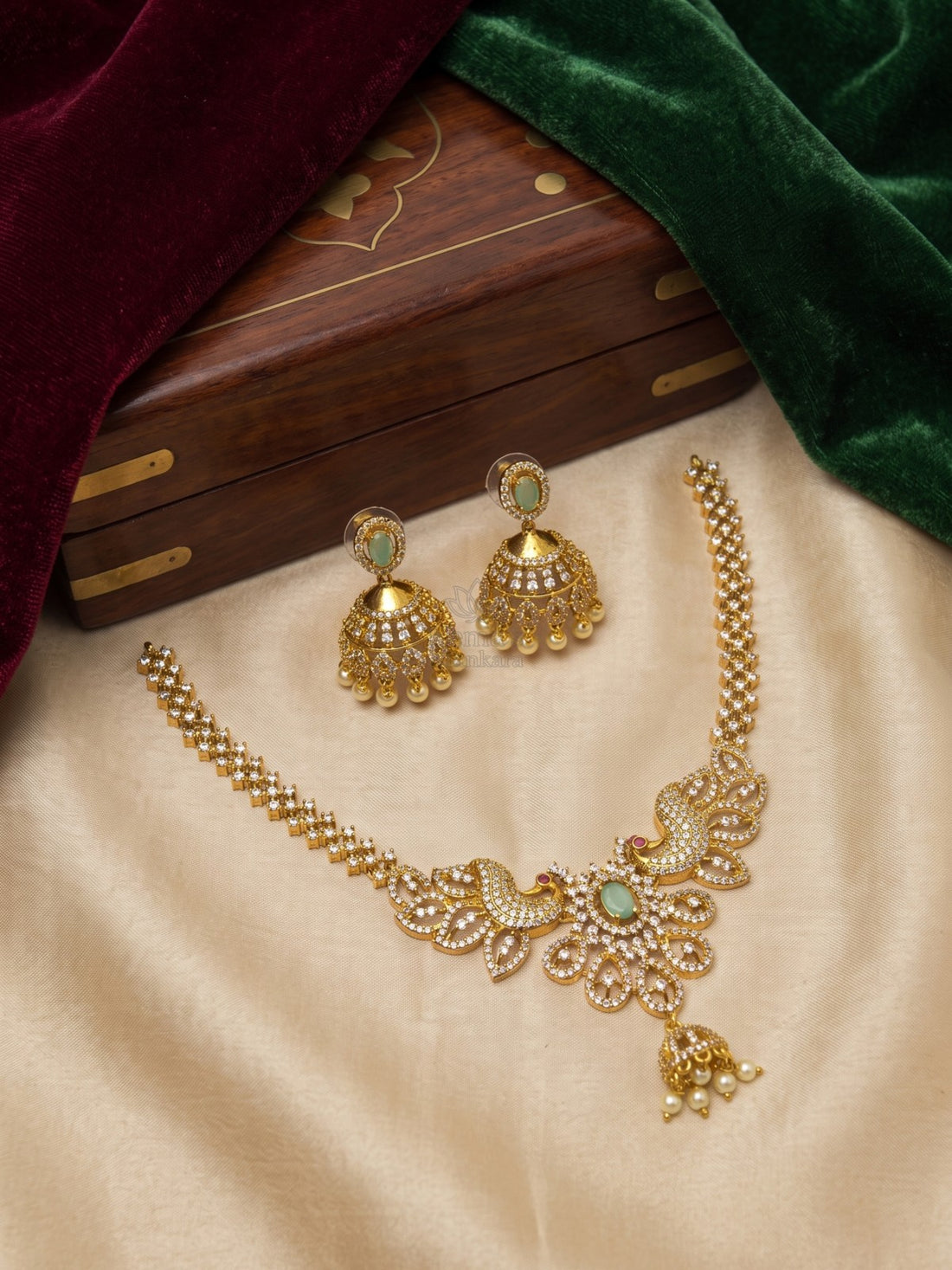 Regal Peacock Zircon Necklace Set with Jhumka Earrings | Gold Finish CZ Bridal Jewellery