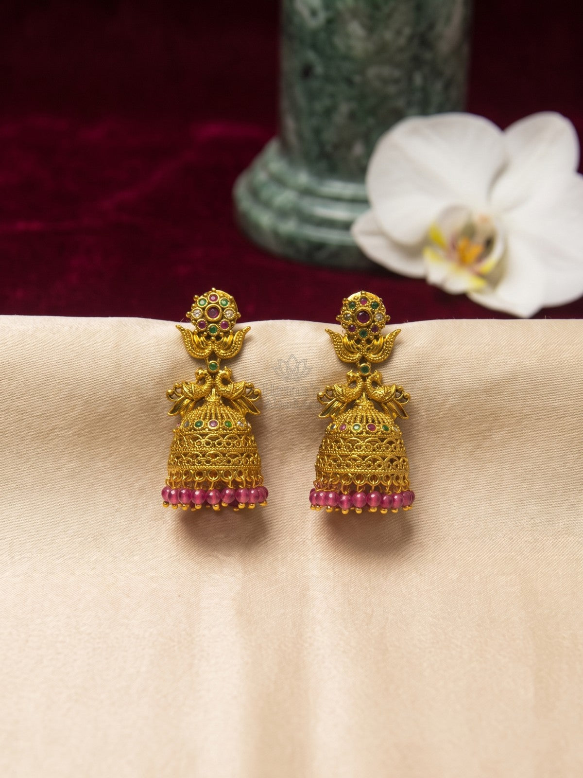 Antique Gold Peacock Jhumka Earrings with Ruby Green Stones & Pink Beads