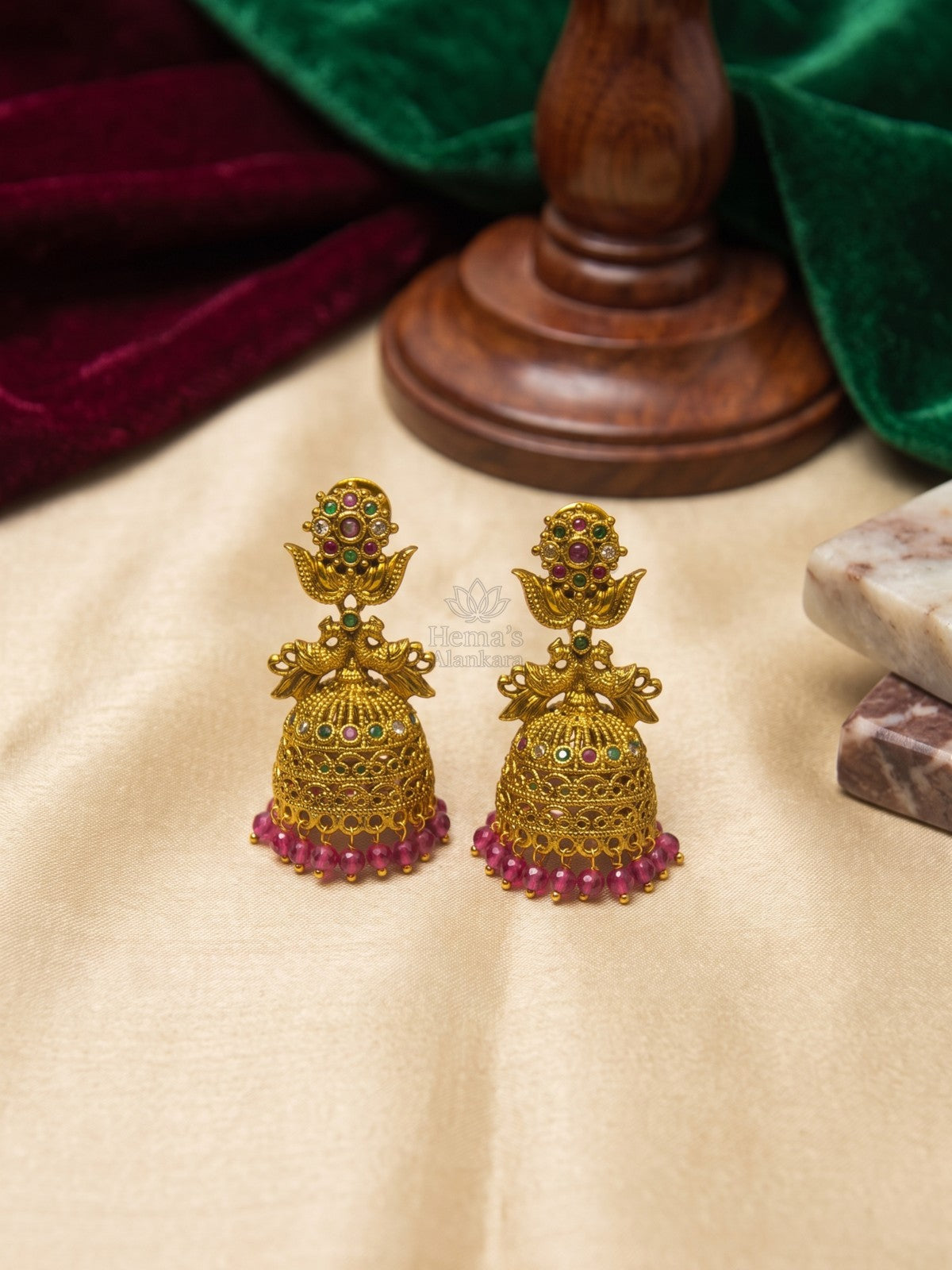 Antique Gold Peacock Jhumka Earrings with Ruby Green Stones & Pink Beads