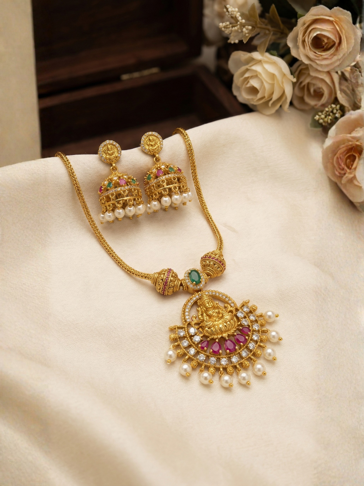 Aishwarya Lakshmi Pink Antique Set with colourful Jhumkas