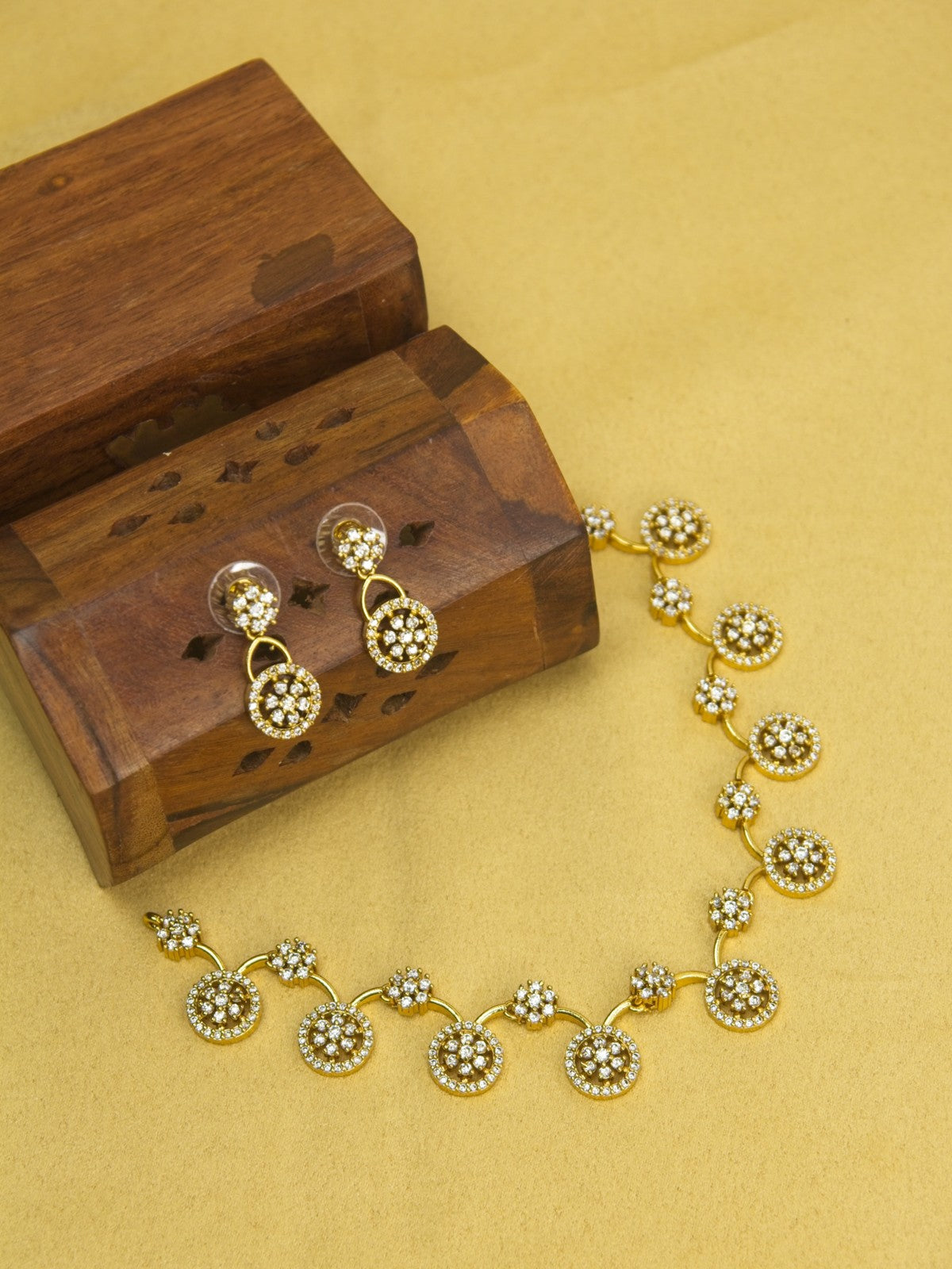 Circular CZ Necklace Set with Drop Earrings – Gold Finish Floral Motif Jewellery